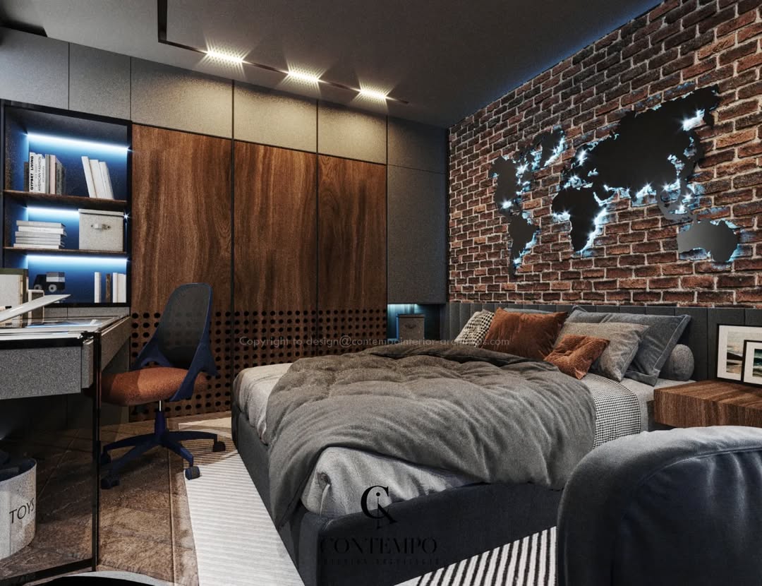 Modern teen boy bedroom with a brick accent wall featuring a world map, wooden wardrobe, desk with shelves, and a neatly made bed with gray bedding.