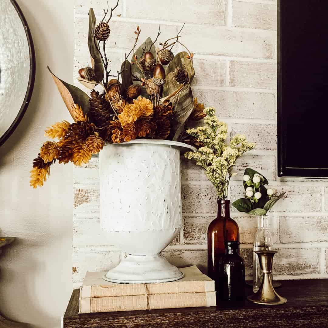 Urn Holds a Bounty of Pinecones and Acorns