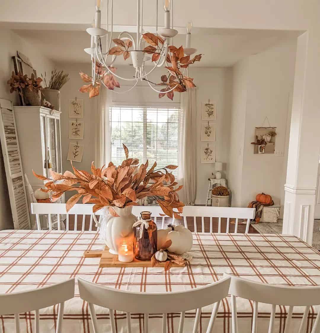 Anchor Autumn Leaves and Pumpkins in a White Pitcher