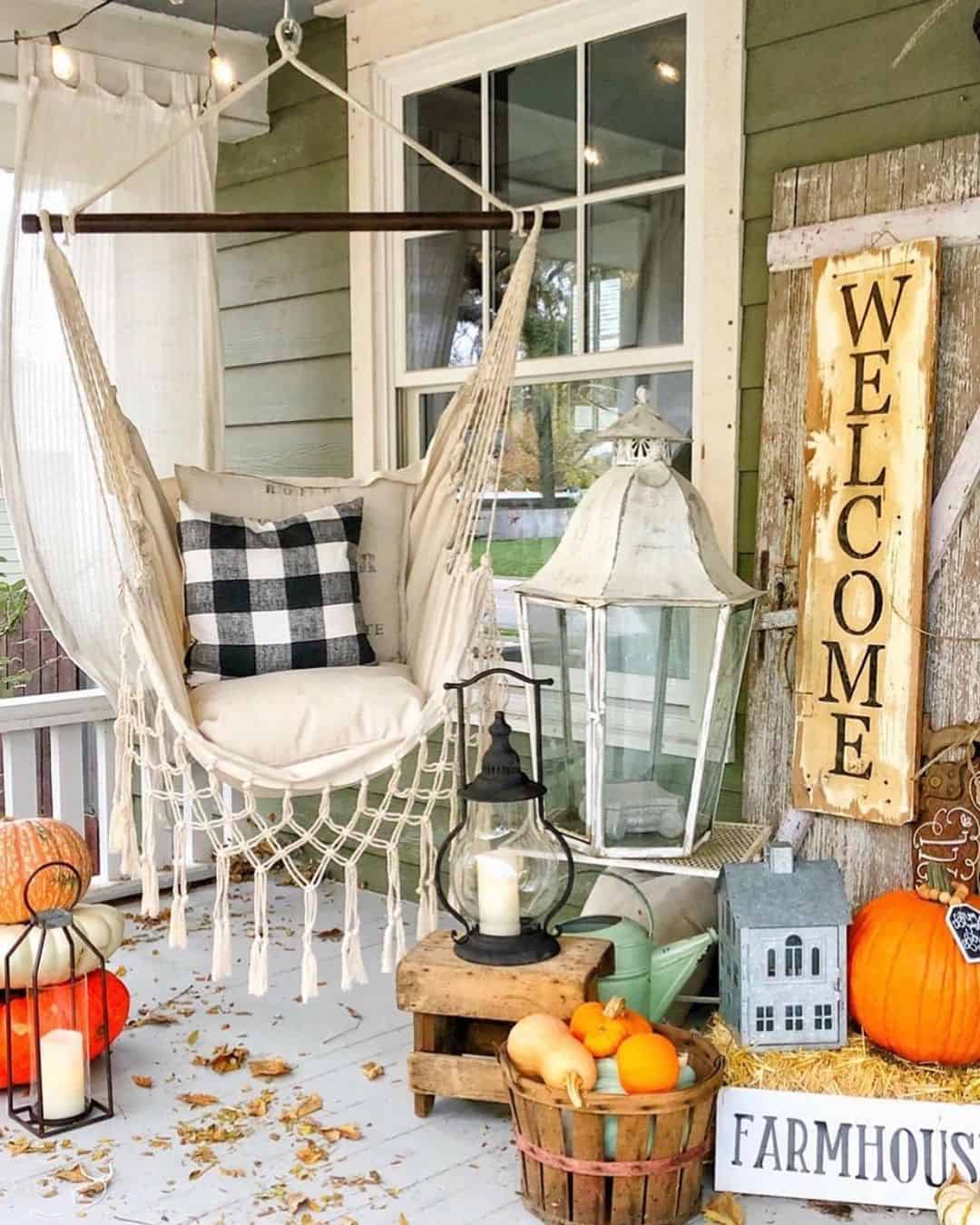 White Lanterns with Glass Panels Frame Mums and Pumpkins