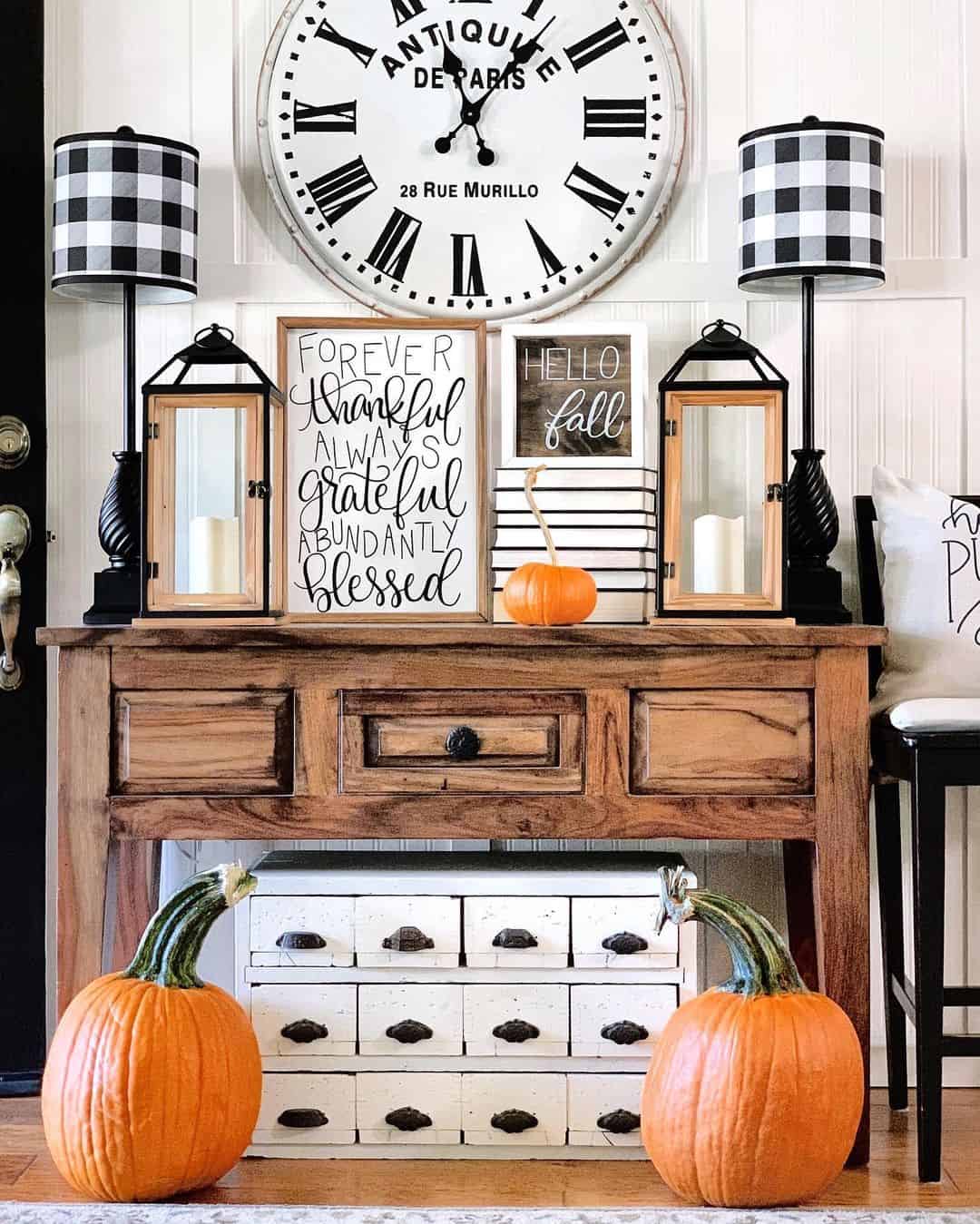 Lanterns Flank Fall Sentiment Signs on Console Table