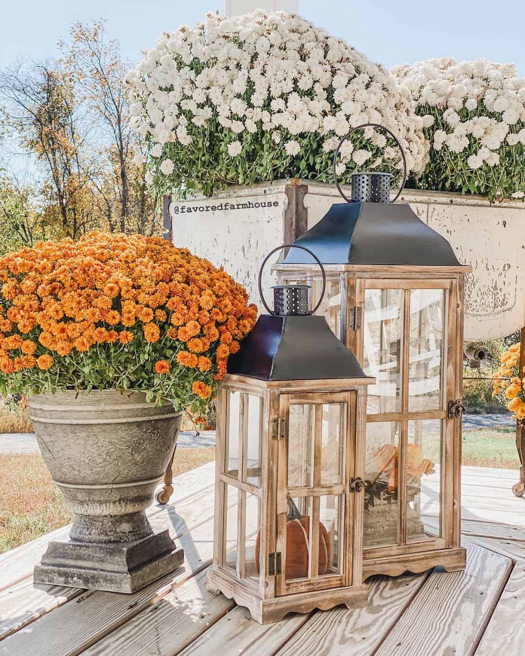 Simple Wooden Lanterns Hold Fall Pumpkins