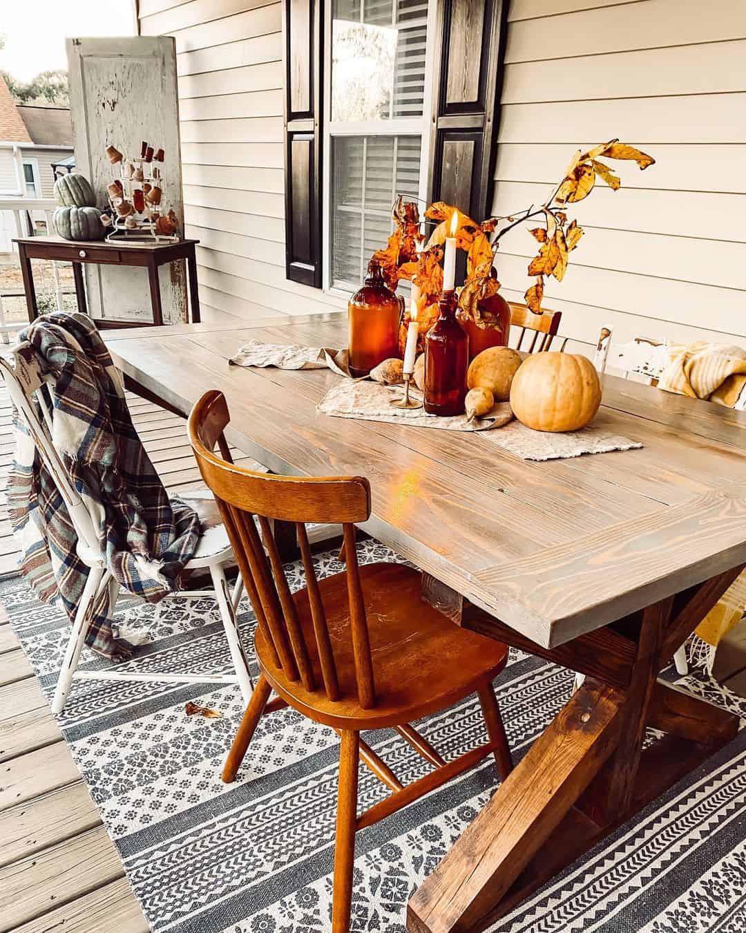 Amber Bottles and Candles Create a Warm Tabletop Vignette