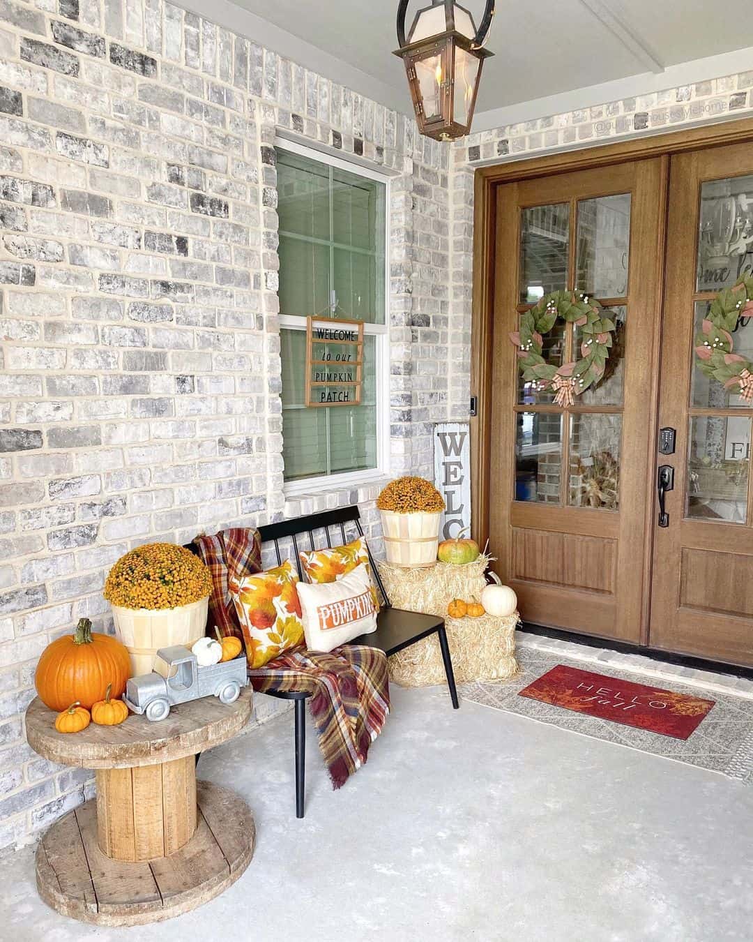 Wooden Spool Table Grounds a Charming Fall Vignette