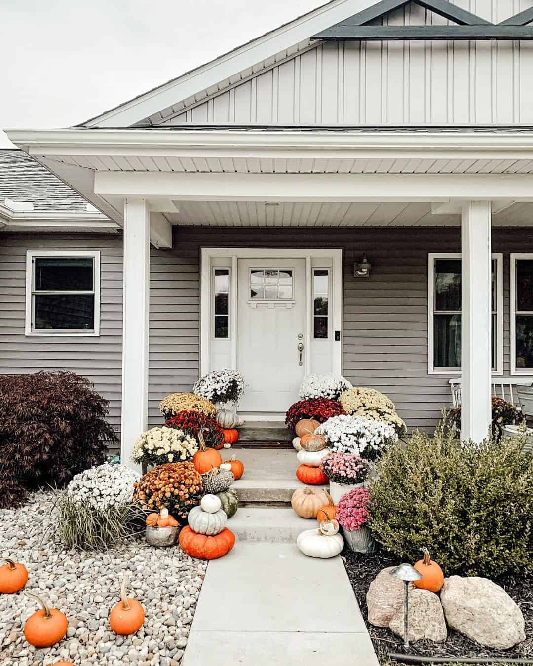 Tiered Pumpkin Stacks Line the Walkway