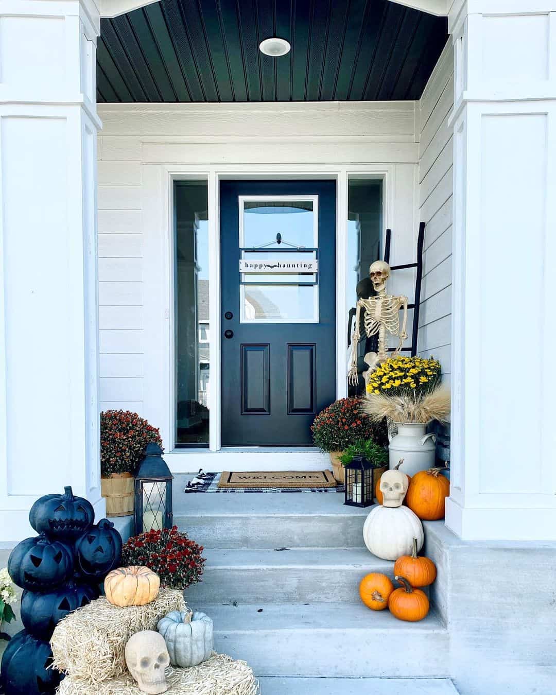 Stack Black Jack-o'-Lanterns On Hay Bales For A Whimsical Porch
