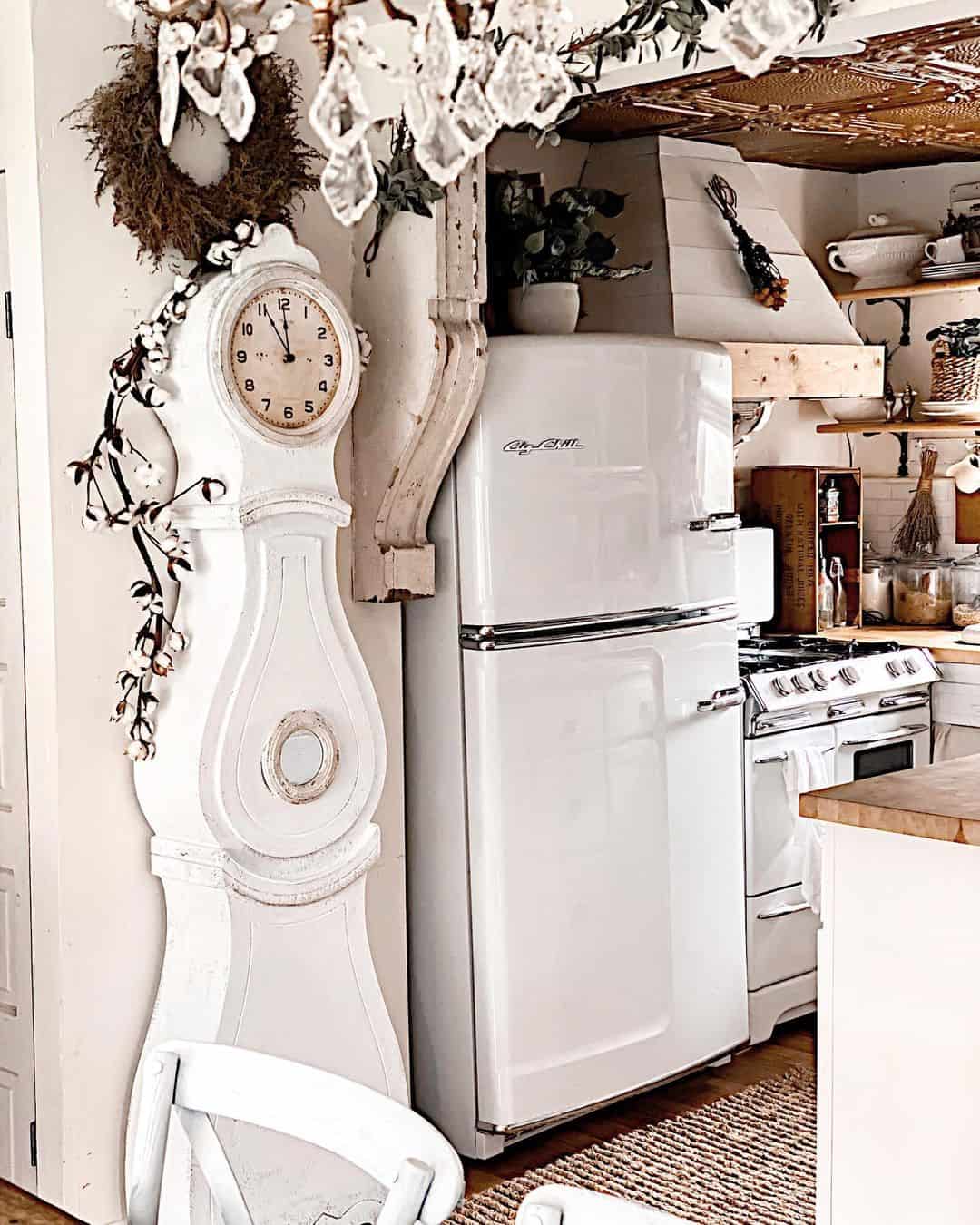 Pair a White Mora Clock with a Distressed Wood Mantel