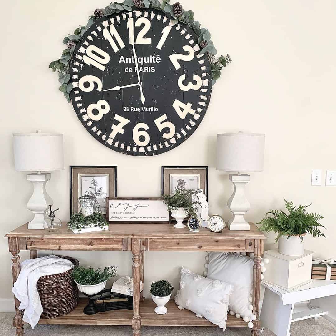 Oversized Black Clock With Garland Accent