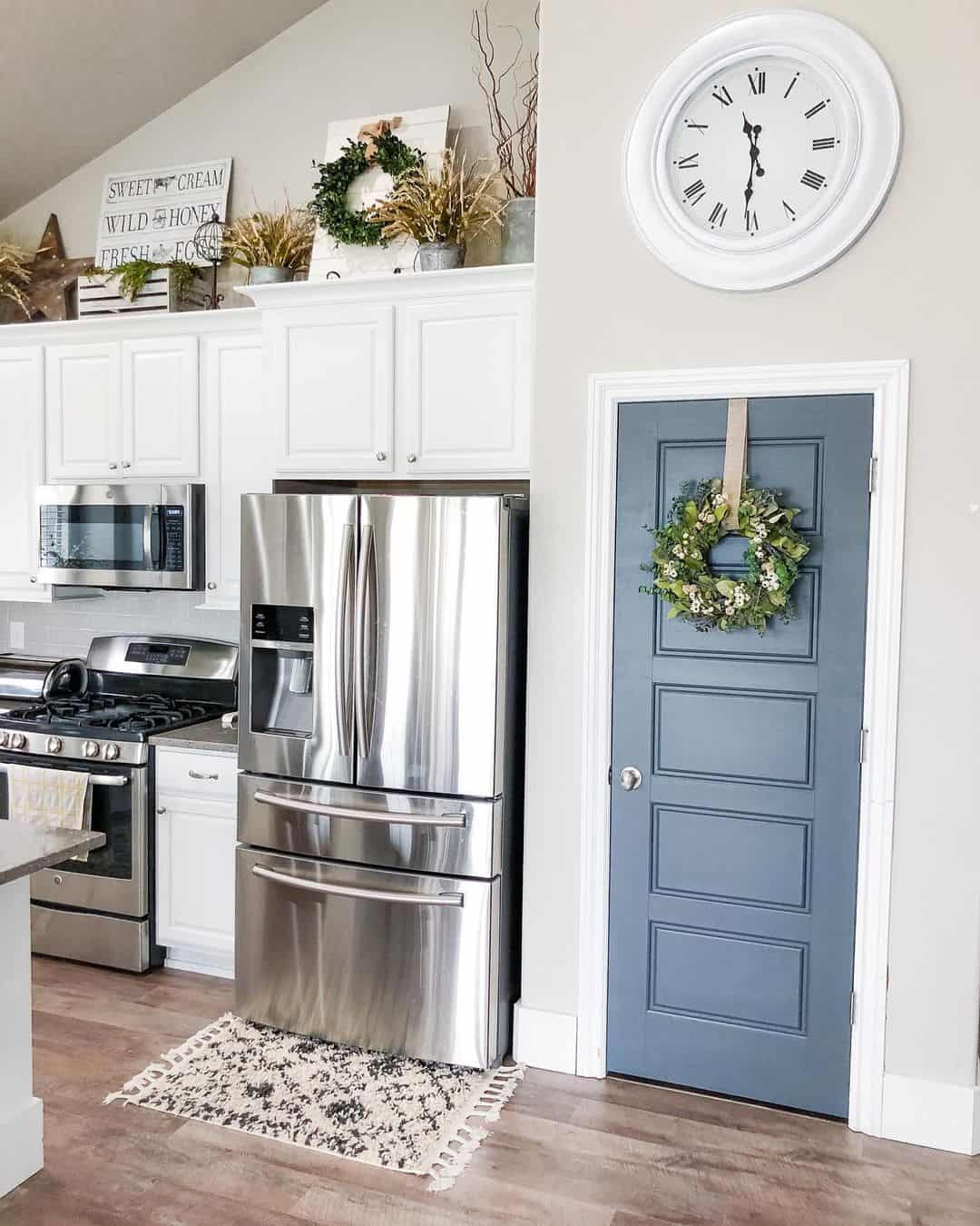 Large White Farmhouse Clock Above the Door