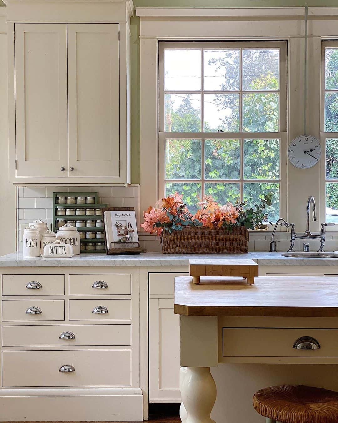 White Farmhouse Clock Adds a Gentle Touch Above the Sink