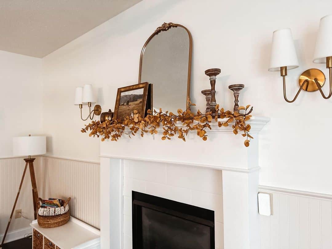 Golden Leaf Garland Frames a Rustic Mantel Display