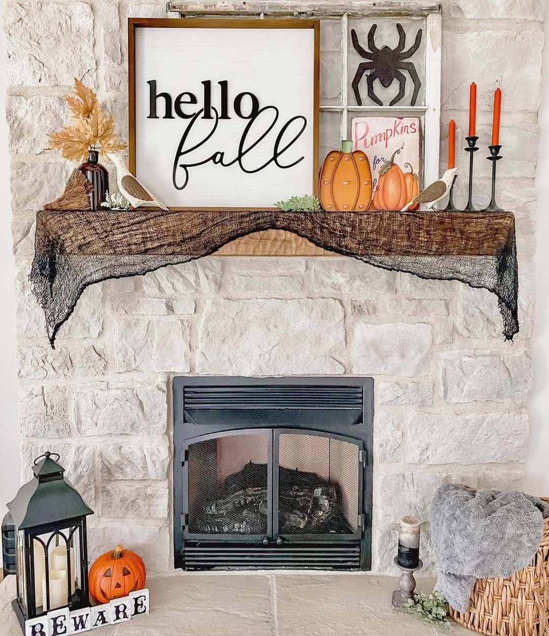 Drape Black Gauze Fabric Over Your Mantel for Spooky Texture