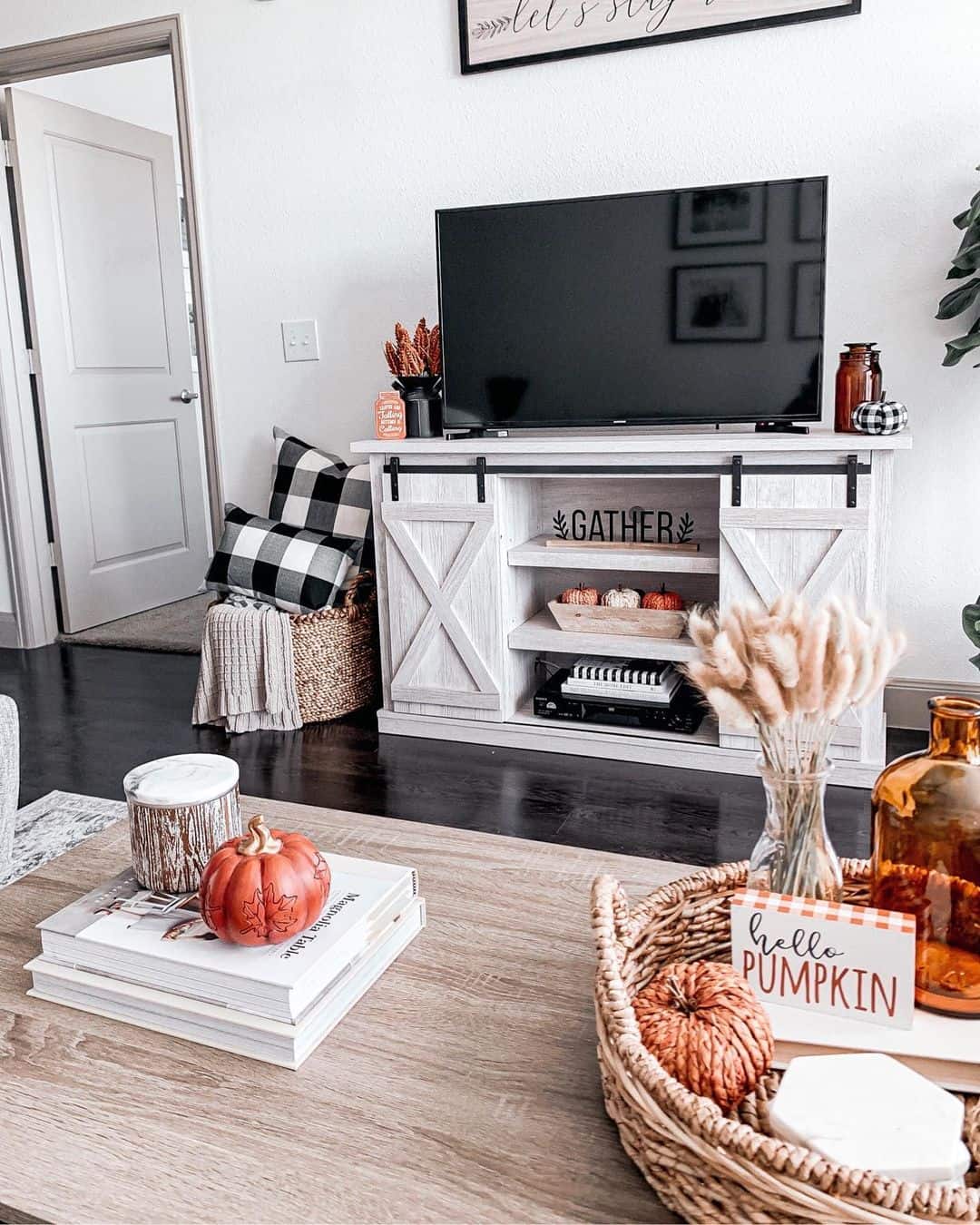 Decorate a White Media Console with Mini Pumpkins and Dried Grasses