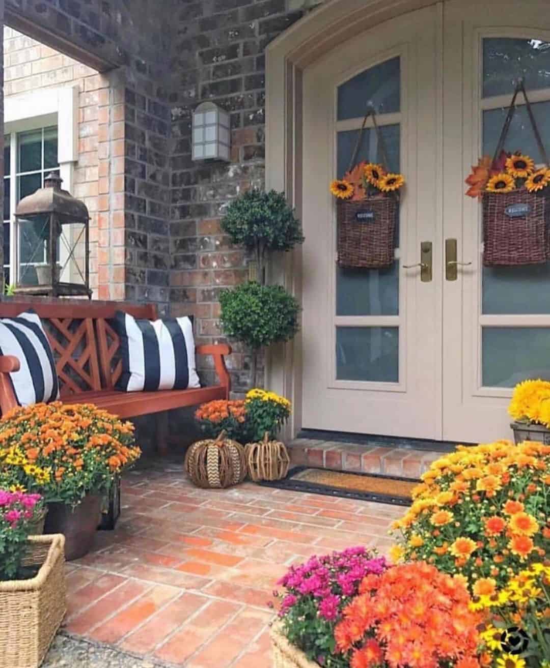 Sunflowers and Leaves Spill from Double Door Baskets