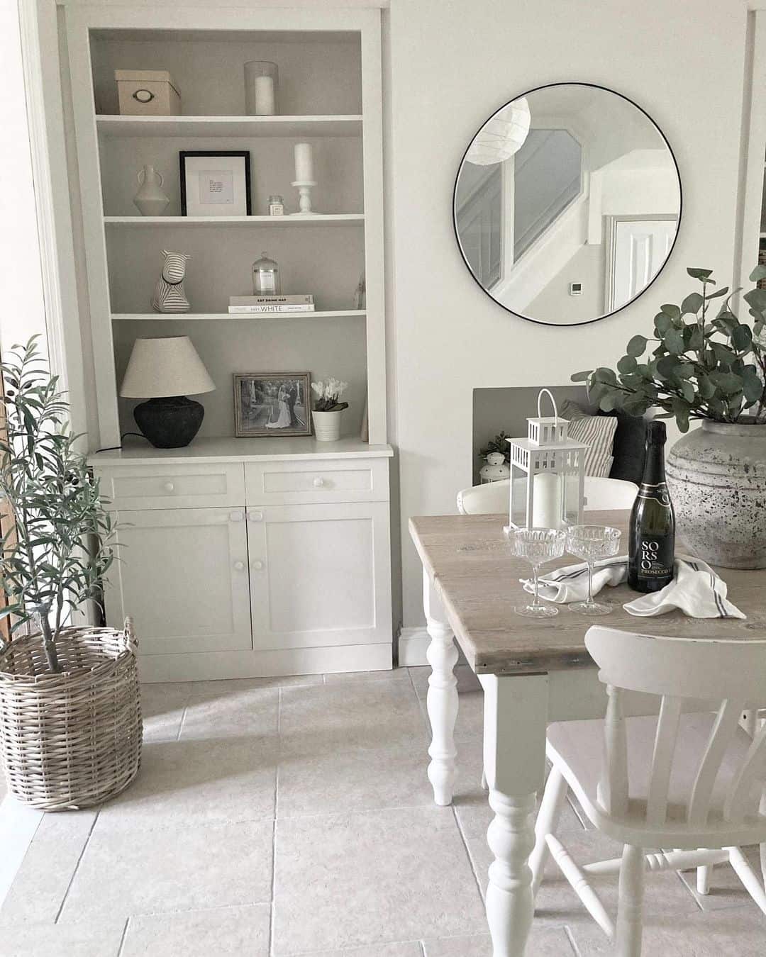 Modern Dining Room With Round Mirror
