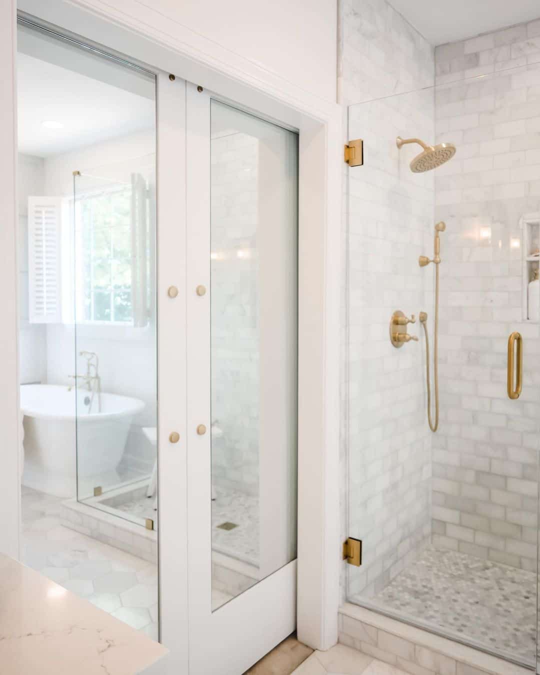 Brass Shower Heads on Random Subway Tile Walls