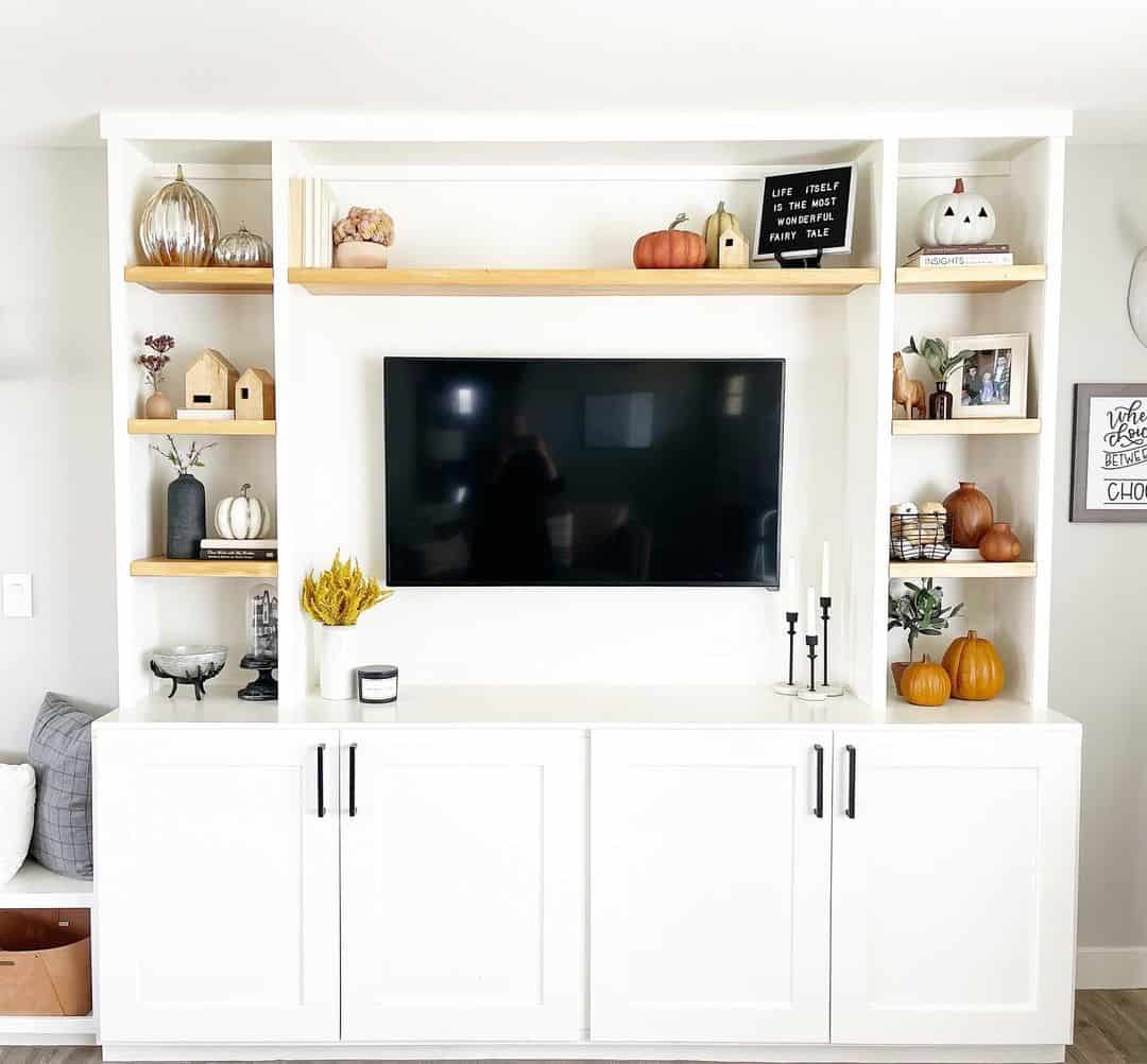 White Entertainment Center With Light Wood Floating Shelves