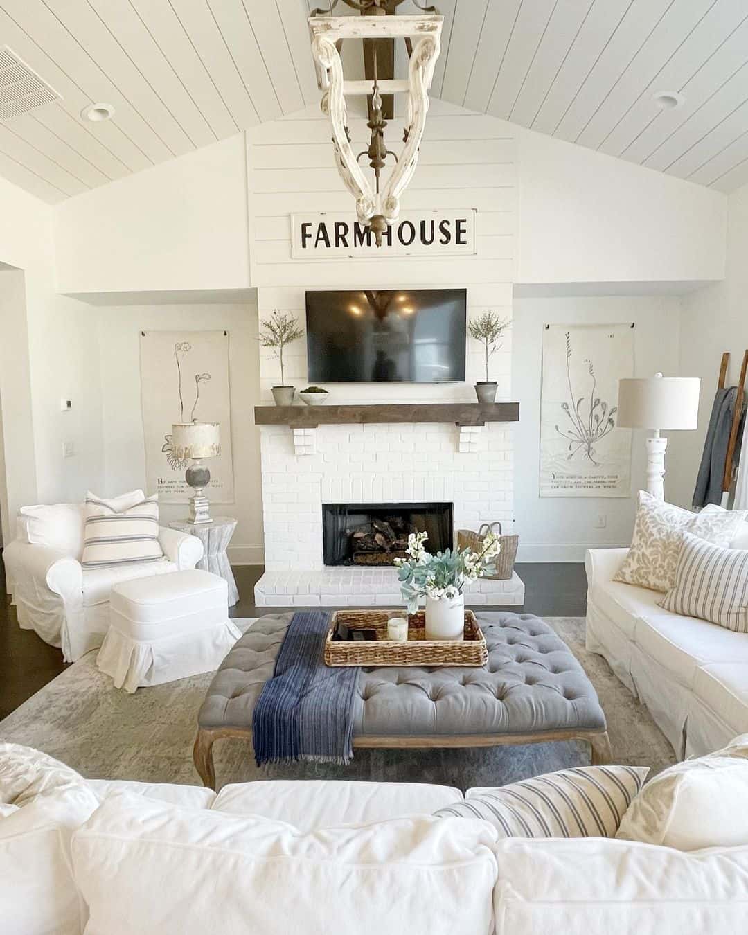 Rustic Chandelier Hangs From Shiplap Ceiling