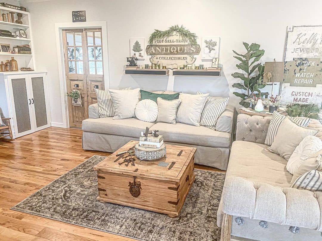 Farmhouse Wall Decor Around Beige Sofas