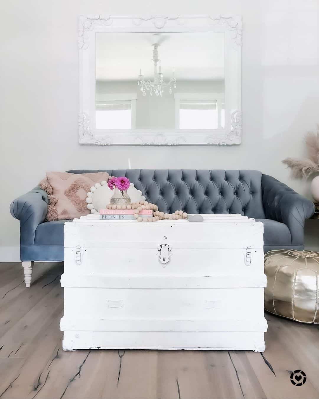 White Trunk Coffee Table with Velvet Sofa