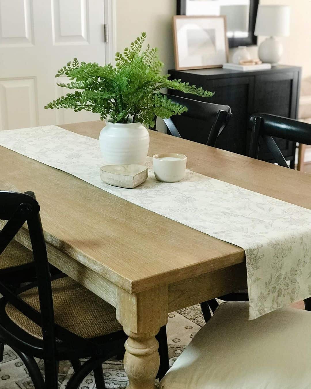 Black Cross-back Chairs Under Dining Table