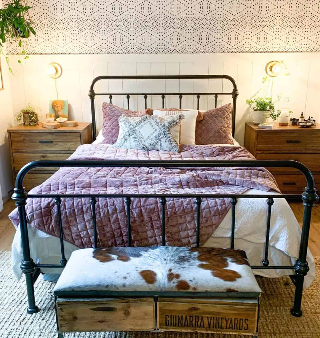 Sconces Above Wide Wooden Dressers with Drawers