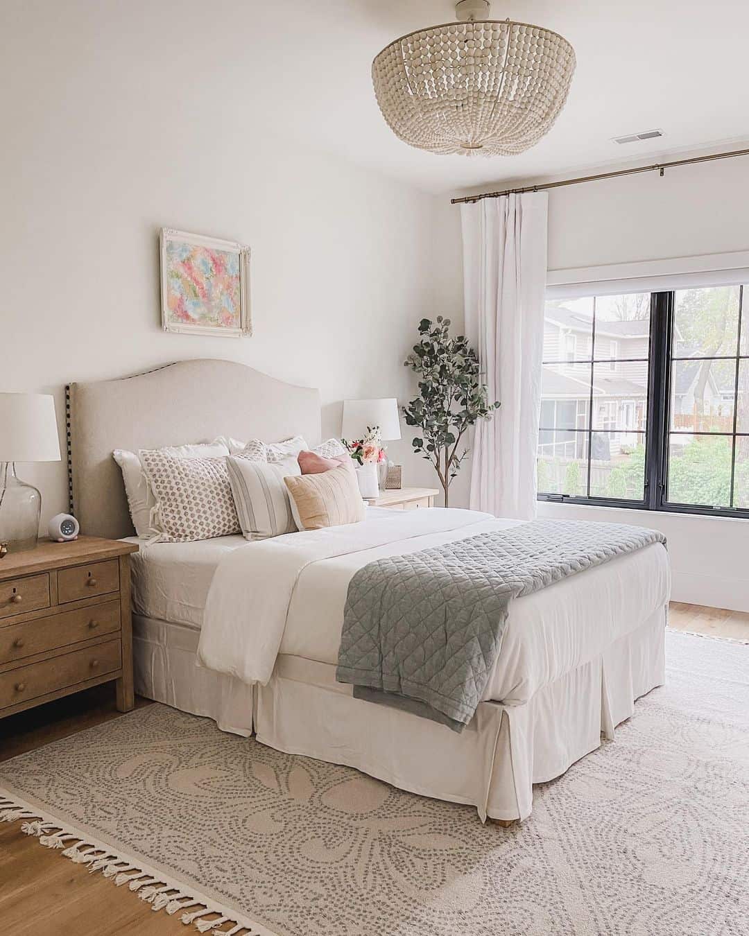 Bed with Beige Studded Upholstered Headboard