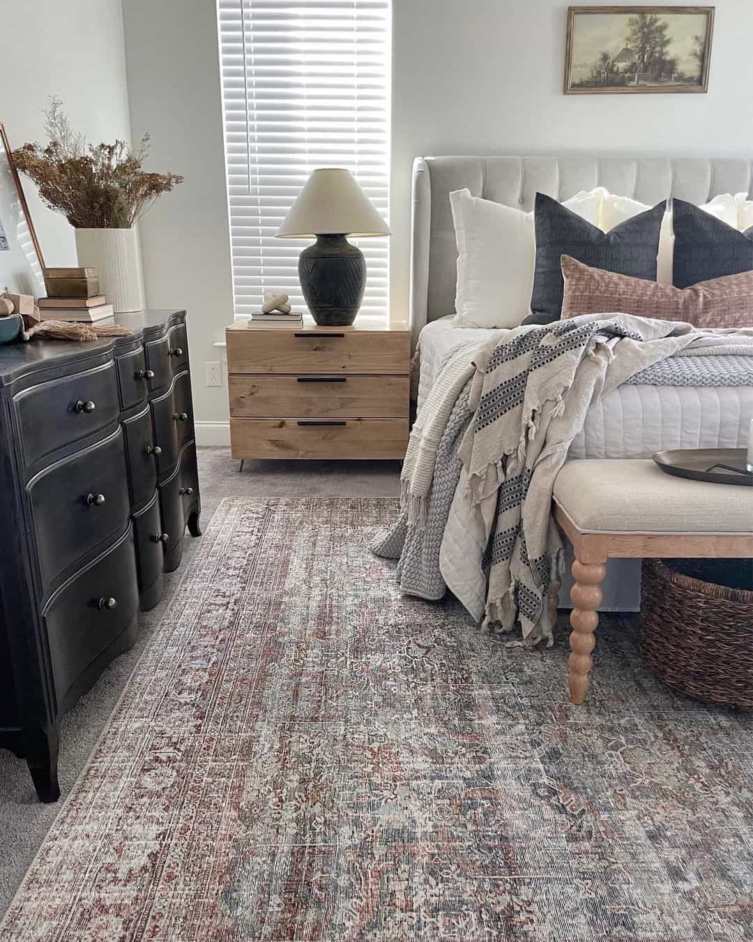 Oversized Black Lamp on a Wooden Nightstand