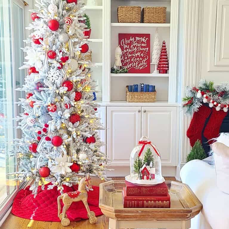 Flocked Christmas Tree with Red and White Ornaments