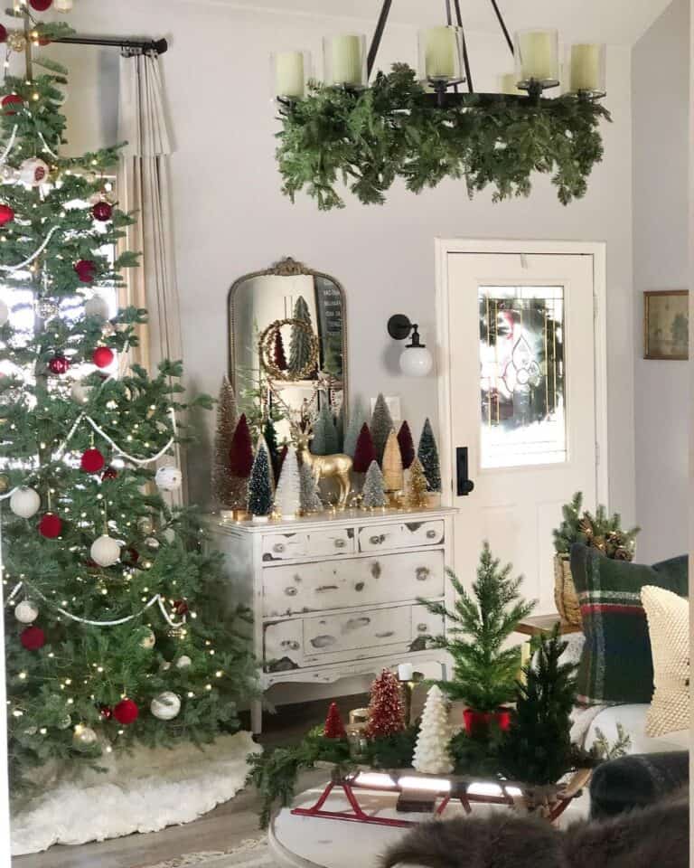 Red and White Christmas Tree Decorations with Vintage Dresser Vignette