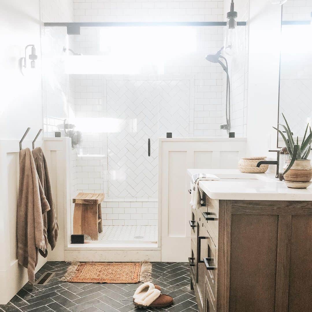 Black Herringbone Tile Flooring in Bathroom