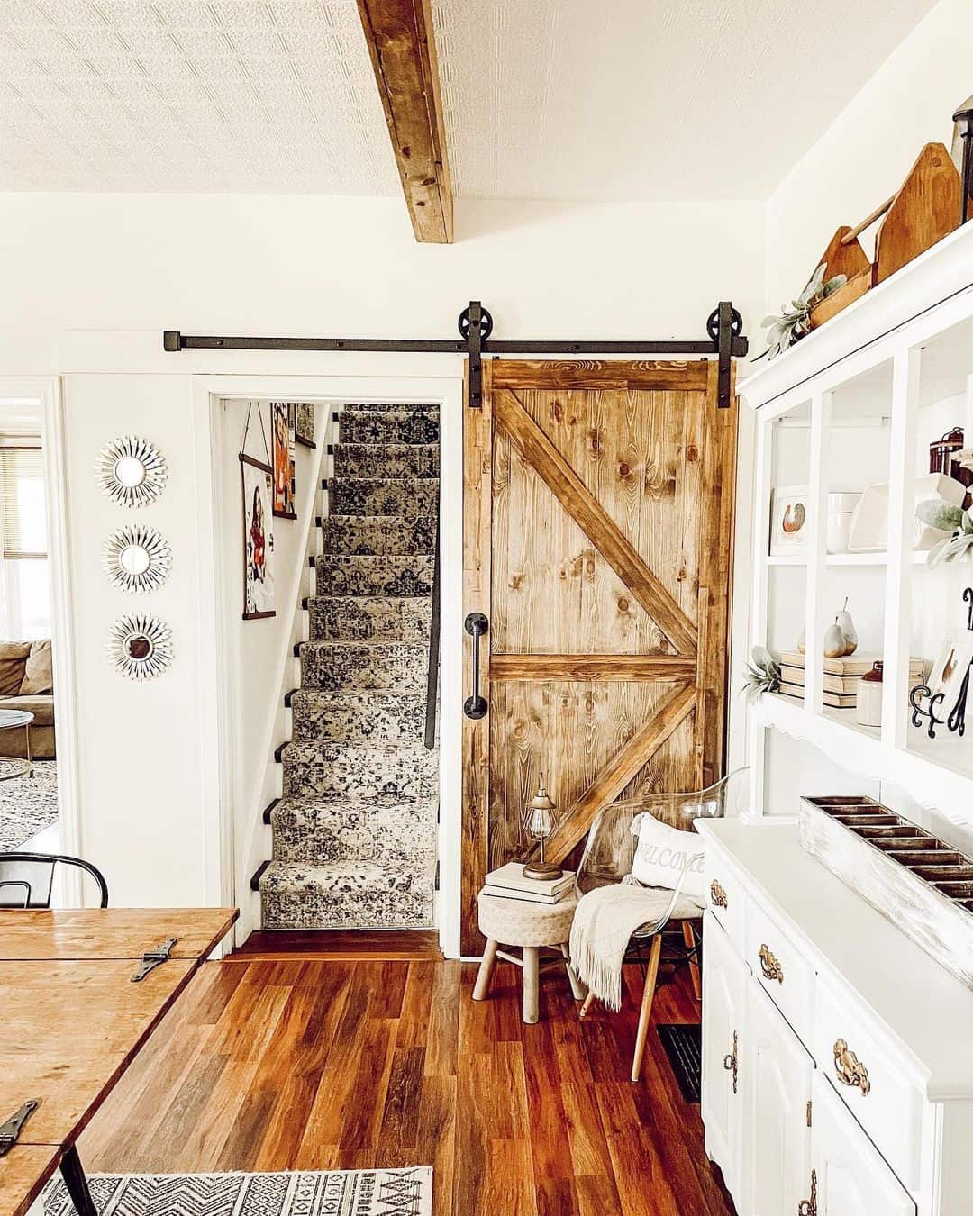 Sliding Barn Door Opens to Reveal Staircase