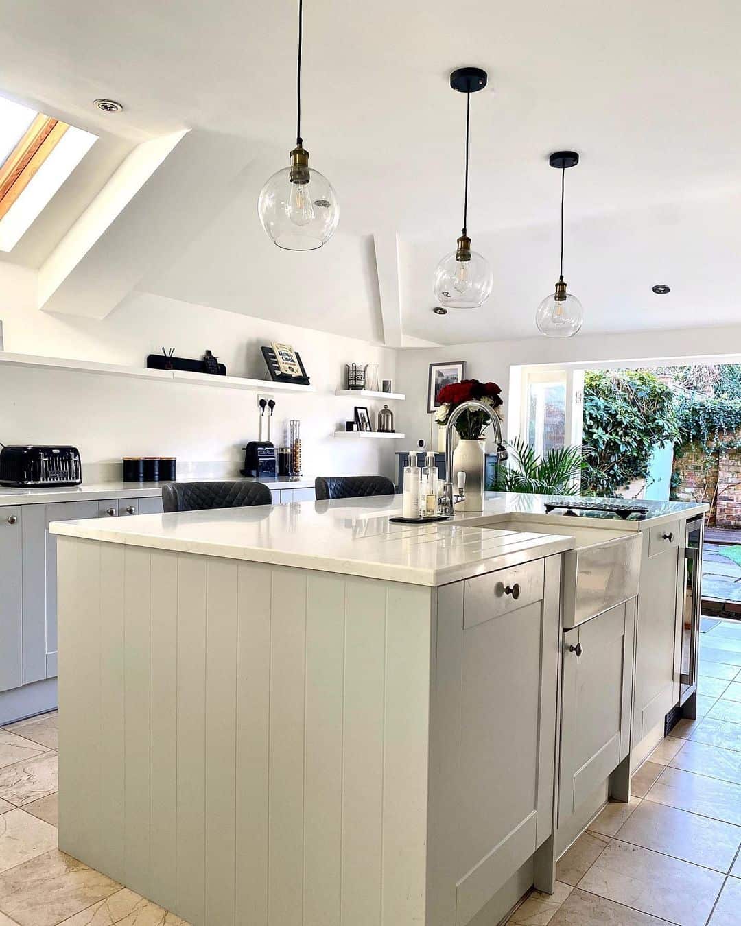 Modern Kitchen With Glass Pendant Lamps