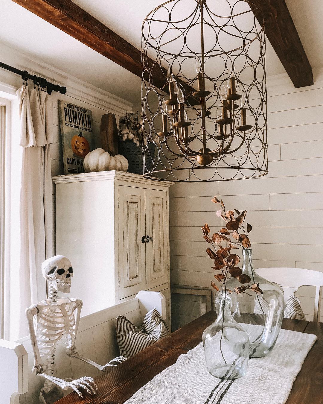 Rustic Dining Nook With a Skeleton at the Table