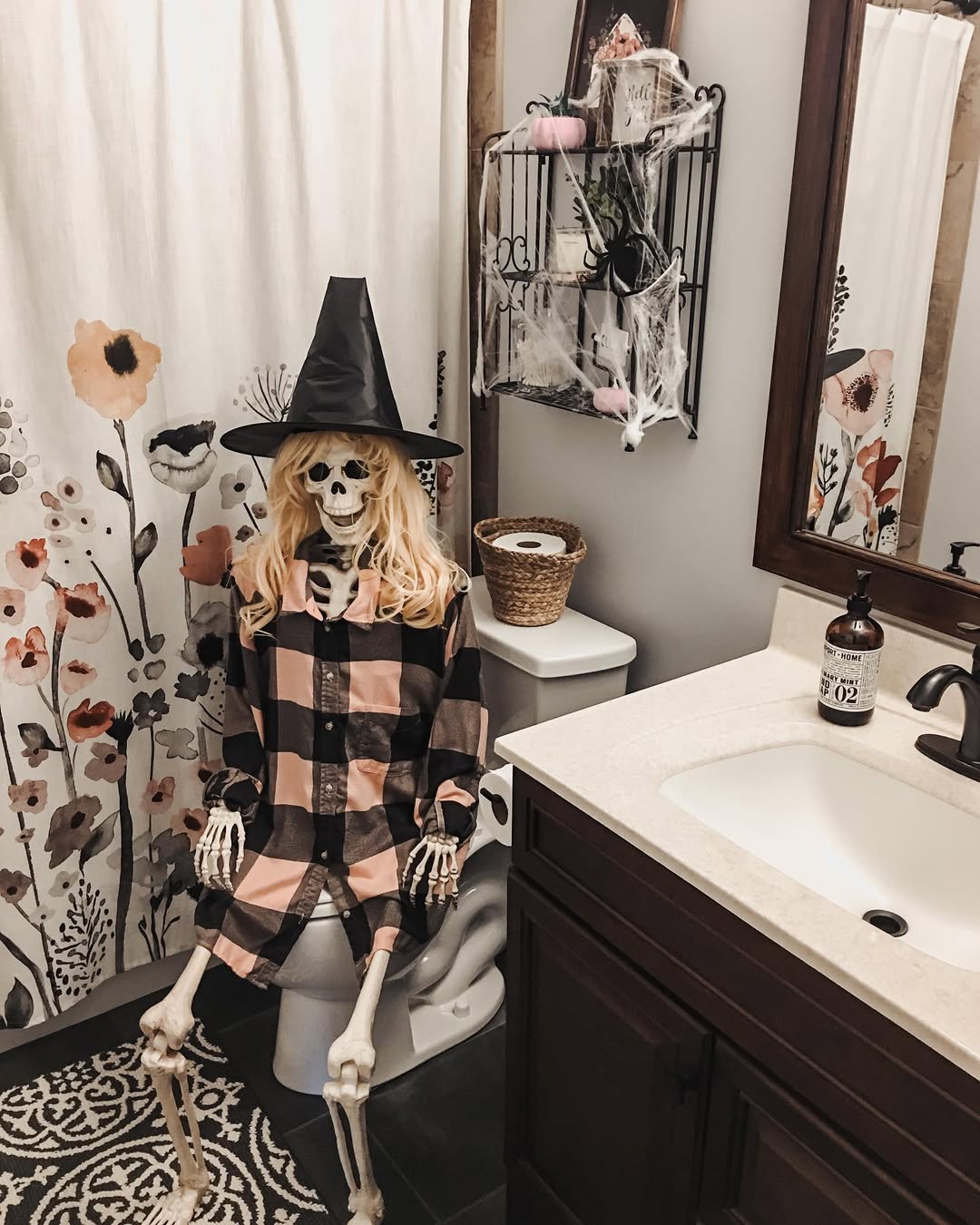 A Witchy Skeleton Brings Humor to the Bathroom