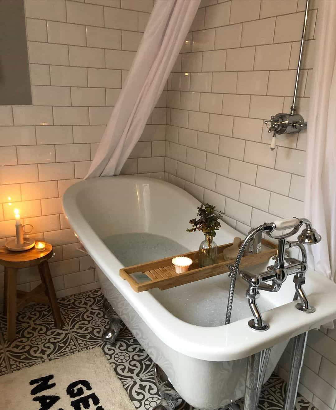 Mosaic Flooring Beneath Clawfoot Bathtub