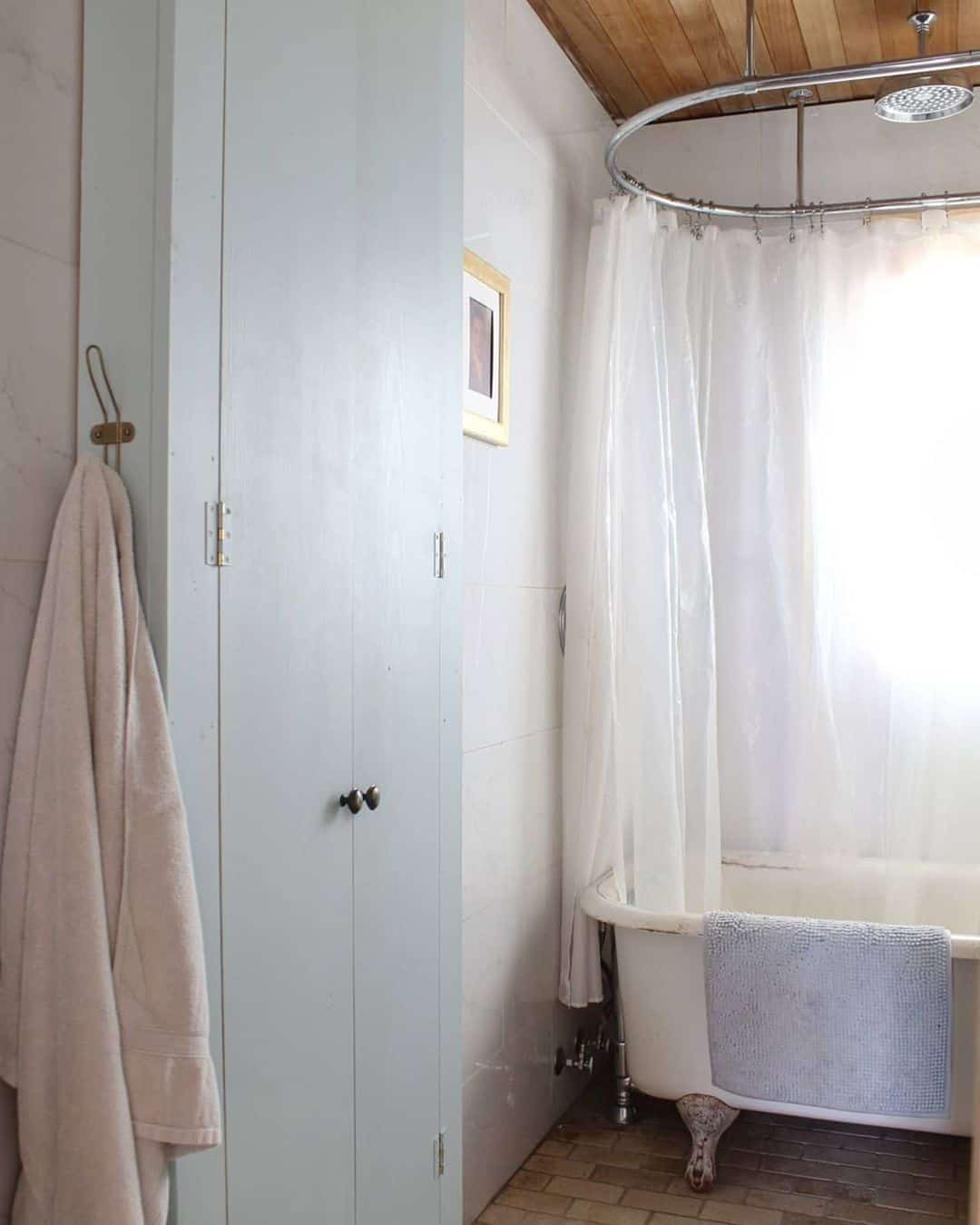 Farmhouse Bathroom With Thin Cabinets