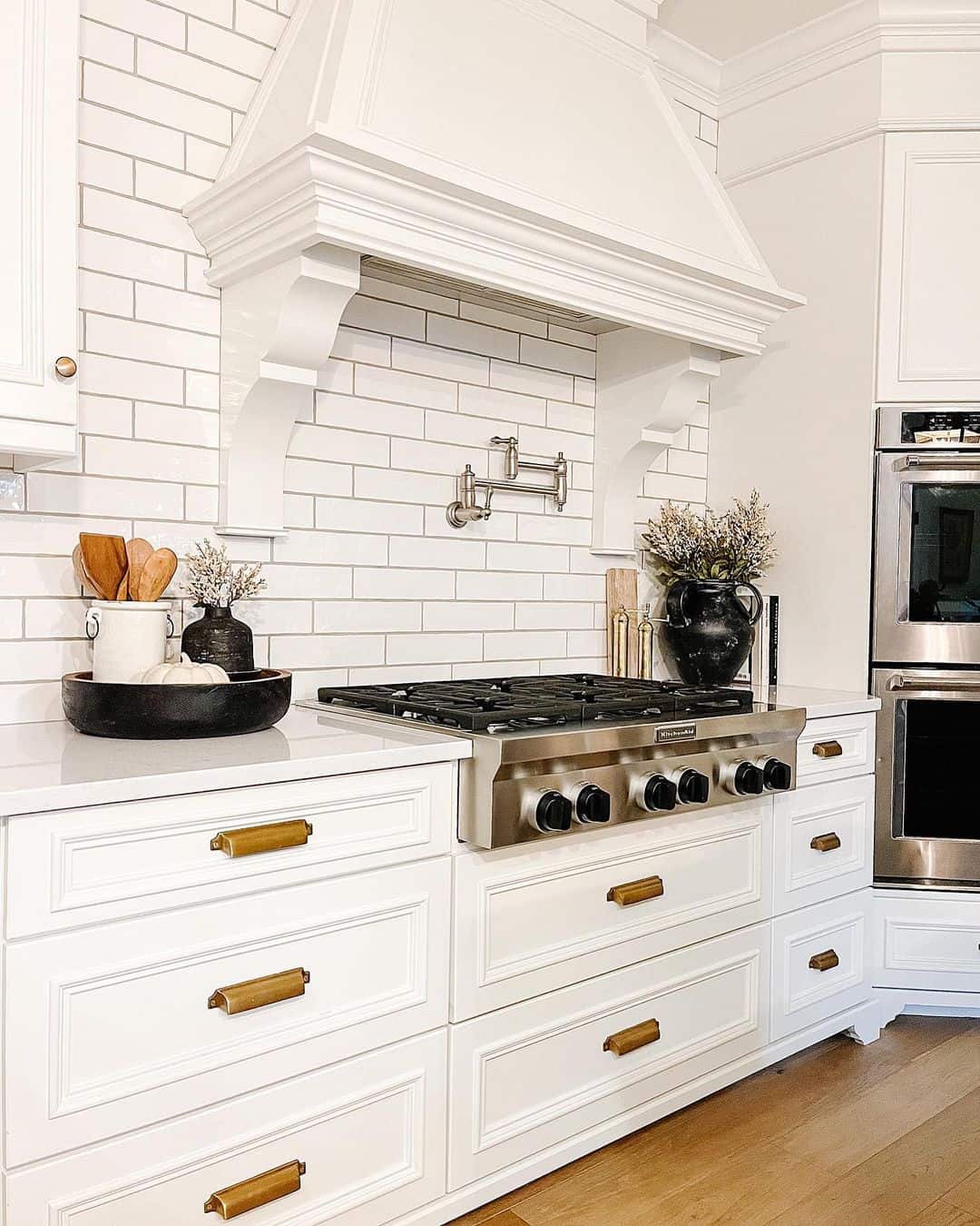 Gold Hardware on White Kitchen Cabinets