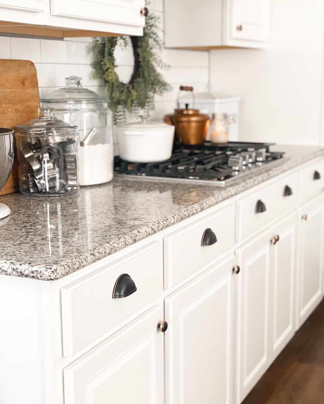 Neutral Kitchen With Black and Gold Hardware