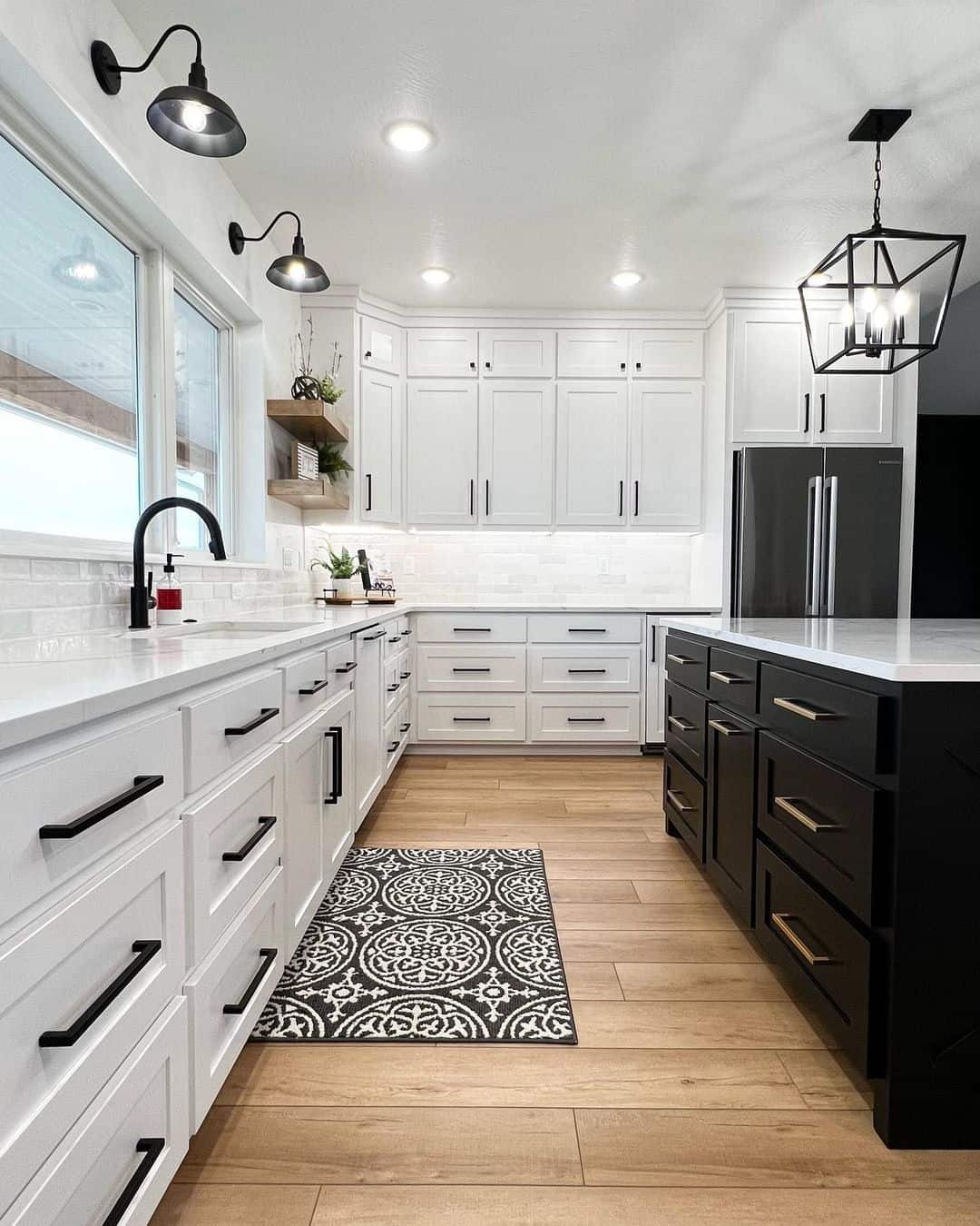 White Kitchen With Black Kitchen Island