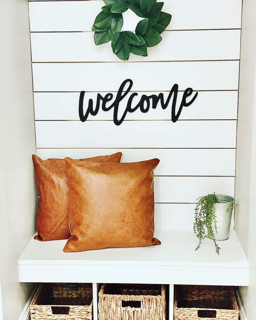 White Built-in Bench With Black Wall Letters