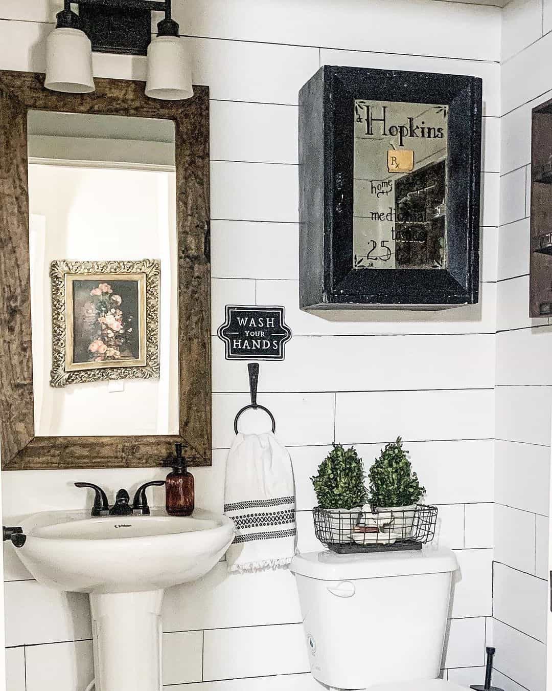 White Shiplap Bathroom With Black Towel Ring
