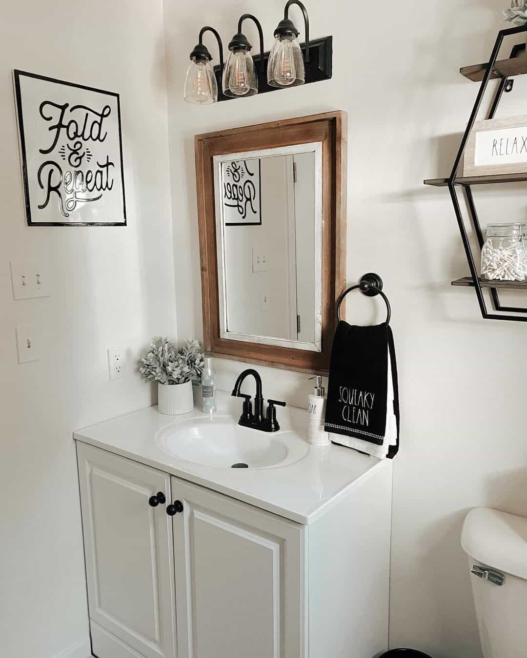 Off-white Washstand With Black Bathroom Towel Ring