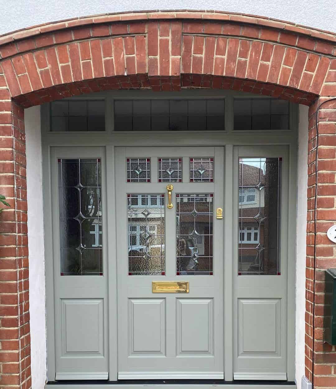 Brick Porch With Light Green Door