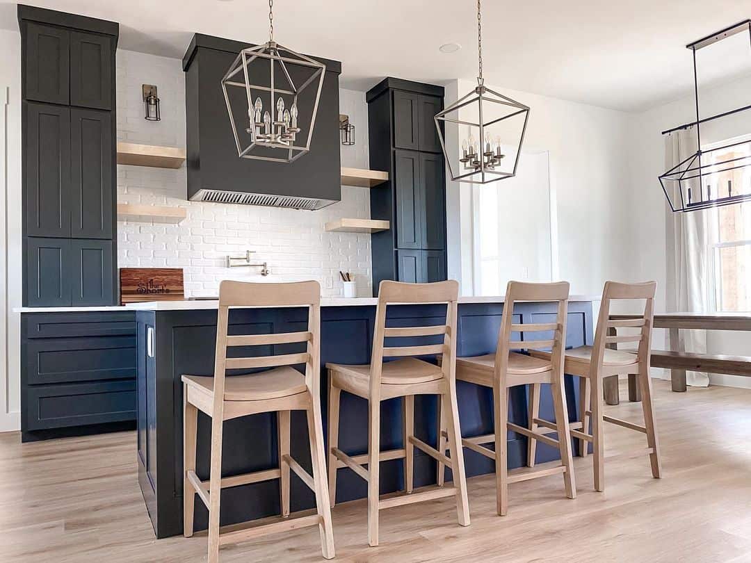 Modern Black Kitchen Cabinetry With Wood Accents