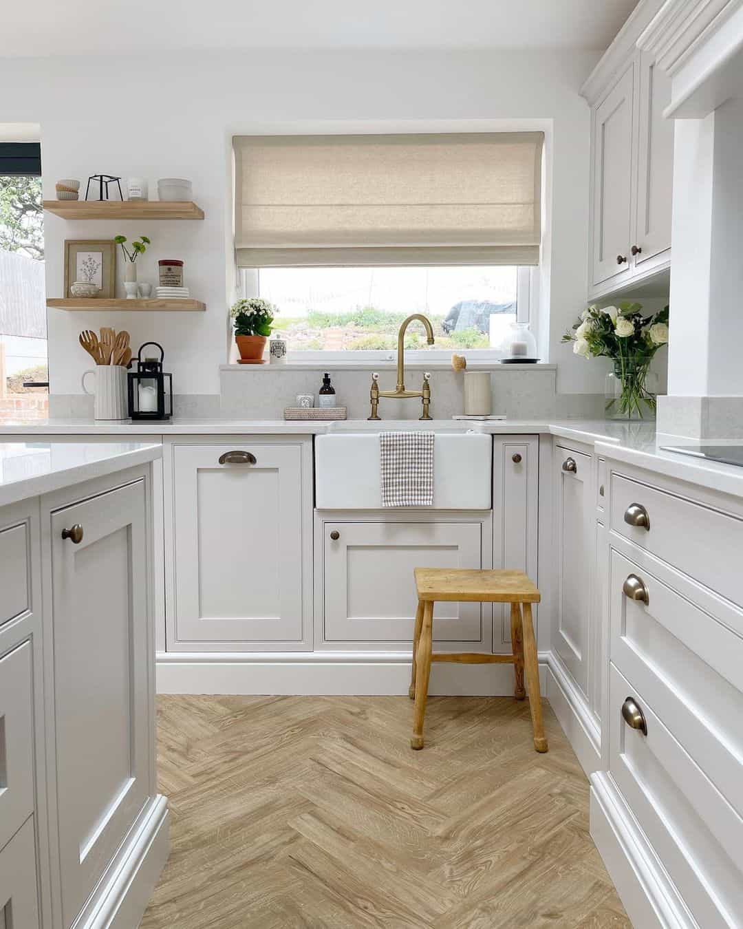 White Kitchen With Rustic Herringbone Floor