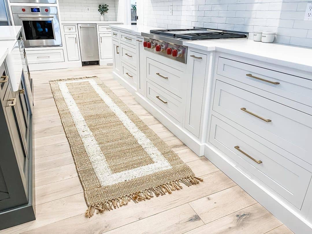 Wooden Kitchen Flooring Ideas With Woven Rug