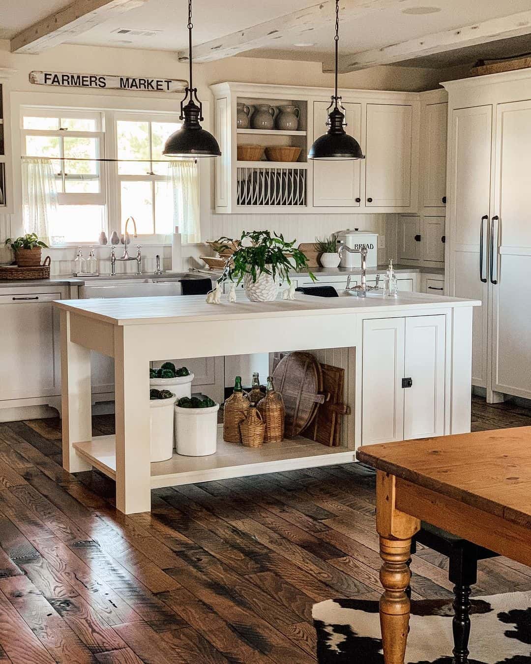 White Canisters on Kitchen Island Open Shelves