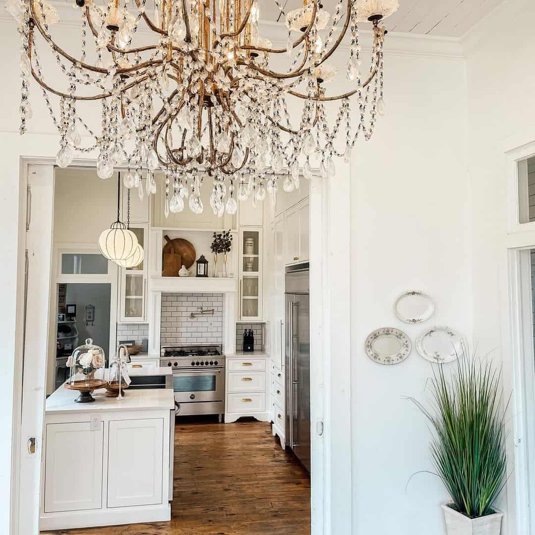 White Kitchen With Gold Chandelier