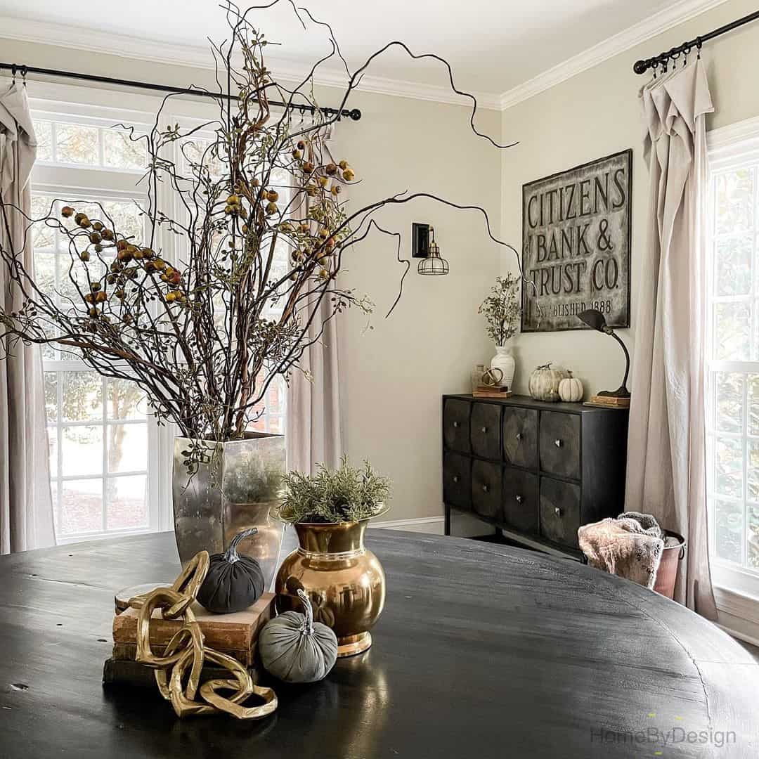Gold Centerpiece Contrasts with Dark Wood